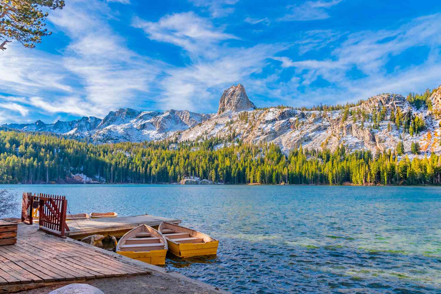 Crystal Crag and alpine forest above a clear lake near Mammoth Lakes